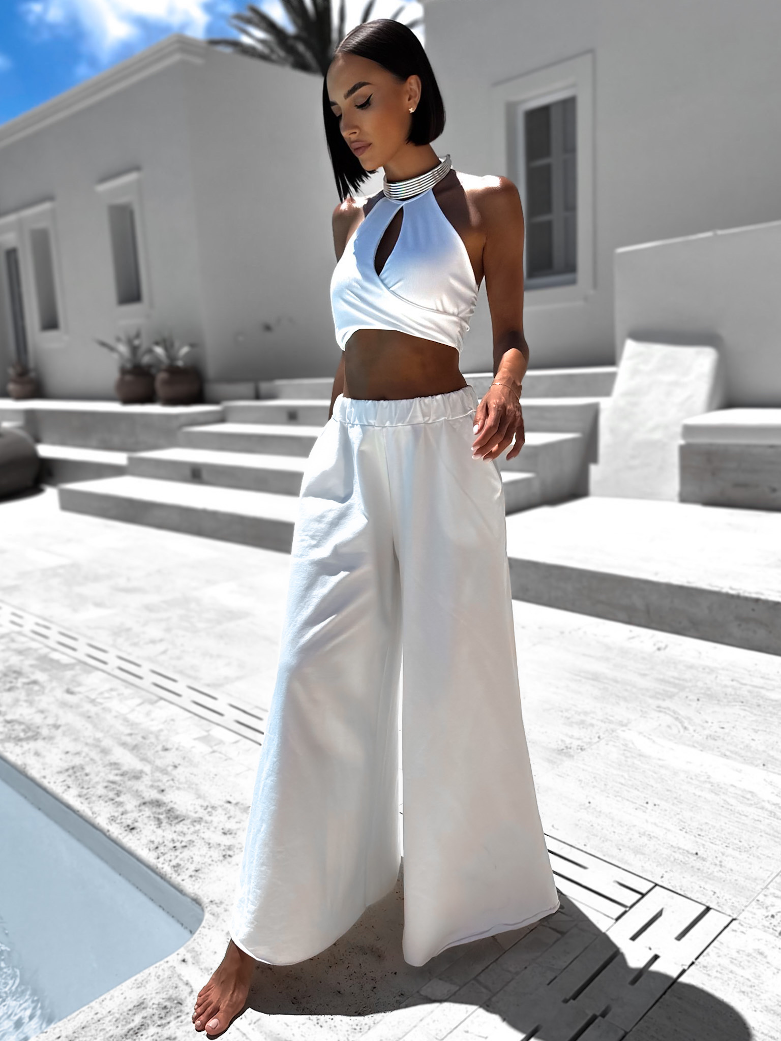 Biele tepláky LADENS so širokými nohavicami Veľkosť: S/M