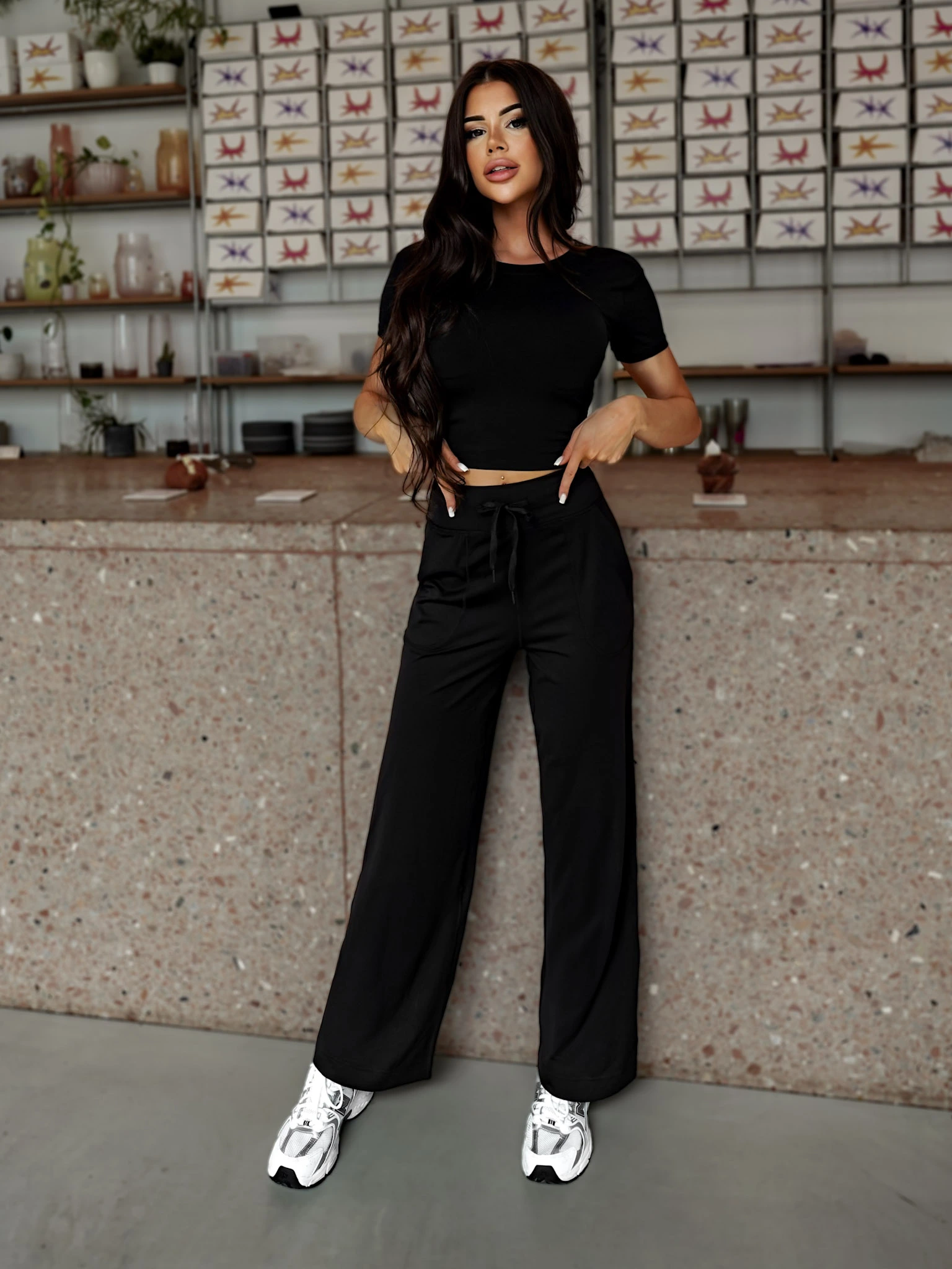 Čierne športové široké tepláky XUZAL Veľkosť: M