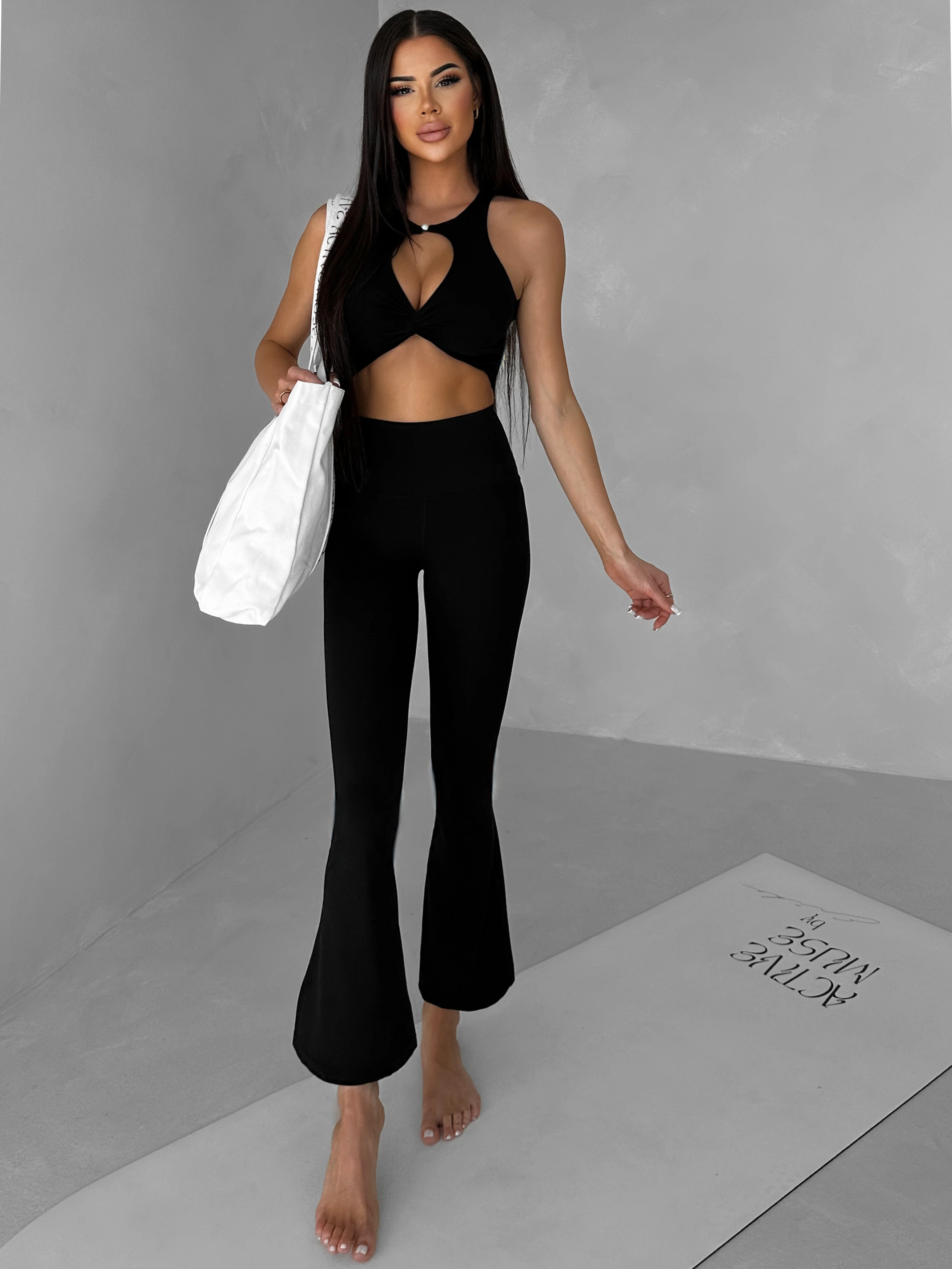 Čierne športové joga zvonové nohavice ZAHIRU Veľkosť: L