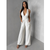 Krémový spoločenský dlhý overal ARVELLA s výstrihom