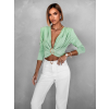 Svetlo zelený elegantný top BOSTRIK s výstrihom