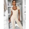 Béžový tvarující overal GRAYZE s krátkým rukávem (Veľkosť M/L)