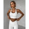 Bílá sportovní fitness podprsenka SONDEL (Veľkosť L)