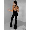 Černý tvarující sportovní overal WOLTERA (Veľkosť L)