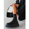 Čierne členkové topánky WINTERO na platforme